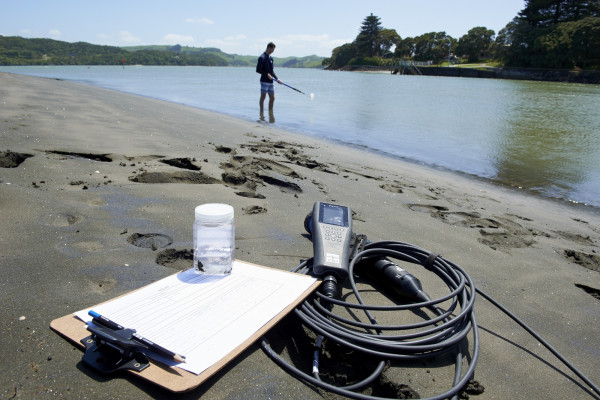 File photo: Water sample being collected as part of Waikato Regional Council’s beach and estuary monitoring programme.  